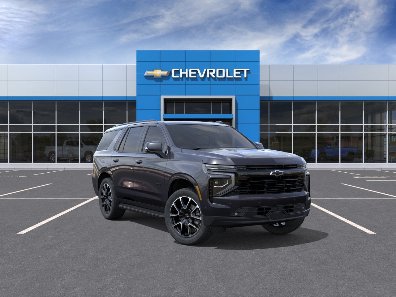 2026 Chevrolet Tahoe RST in Dark Ash Metallic — front three-quarter view
